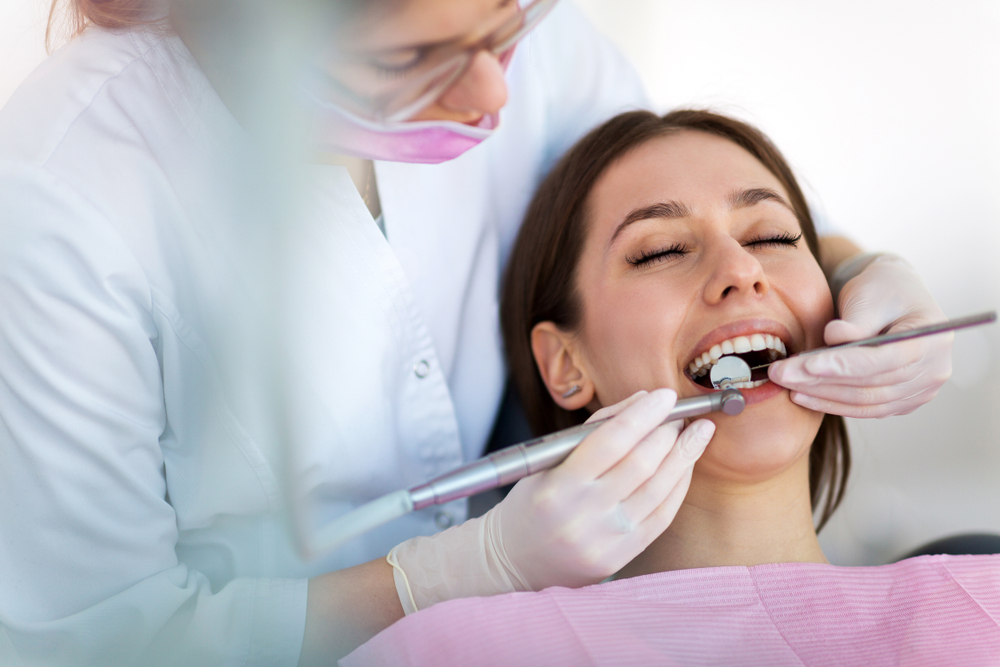 Image of a women at a dental clinic for a Cosmetic Dentistry